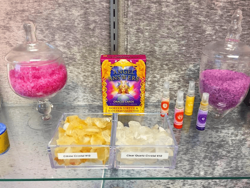Orland Park Psychic shelf with angel oral cards salts crystals and scents